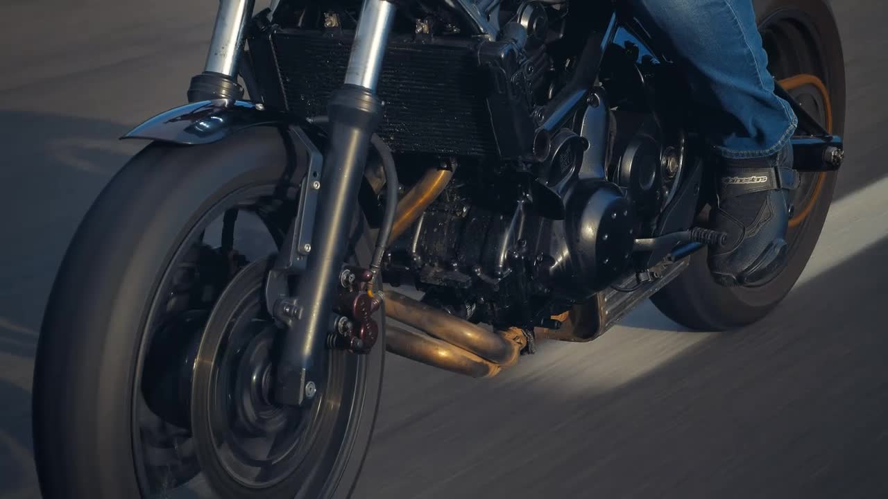 Free Stock Video Wheels Of A Motorcycle Traveling Fast Down A Road Live Wallpaper