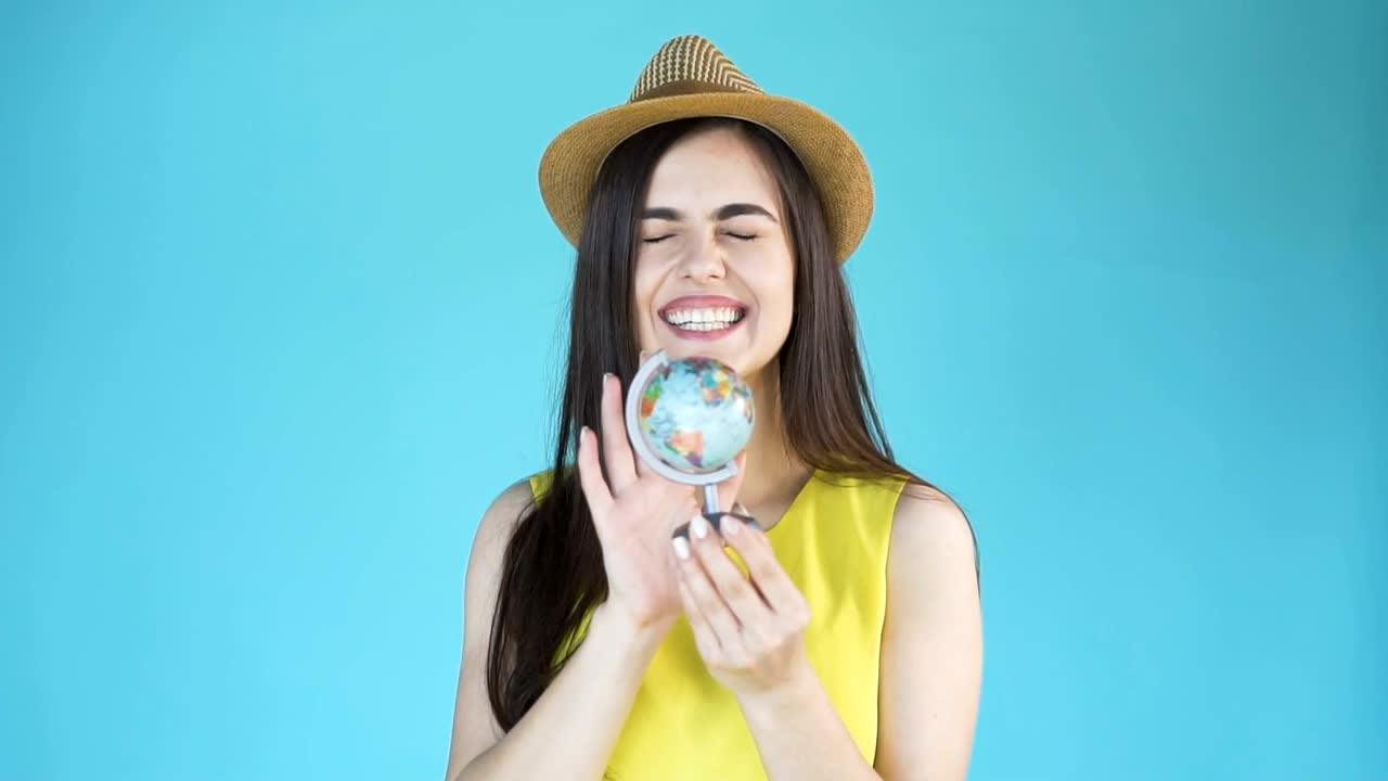   Stock Footage Woman Chooses A Country To Travel On A Globe Live Wallpaper