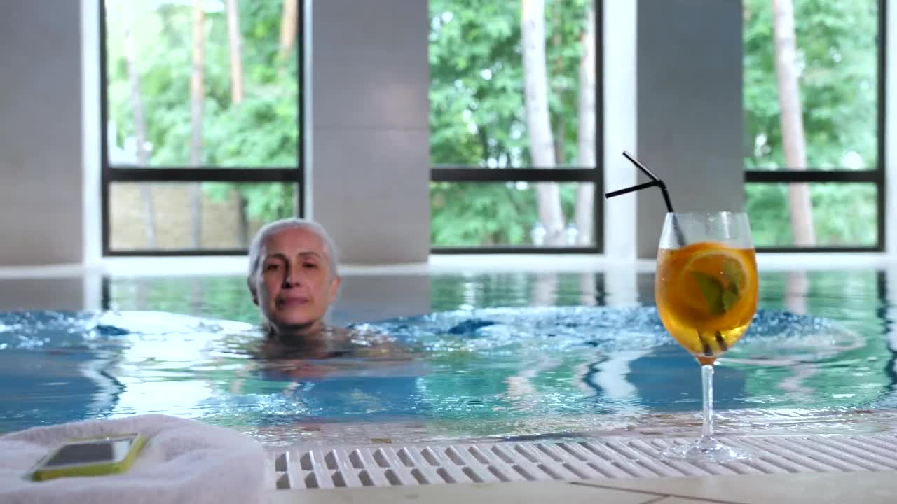   Stock Footage Woman Checking Her Phone In The Pool Live Wallpaper