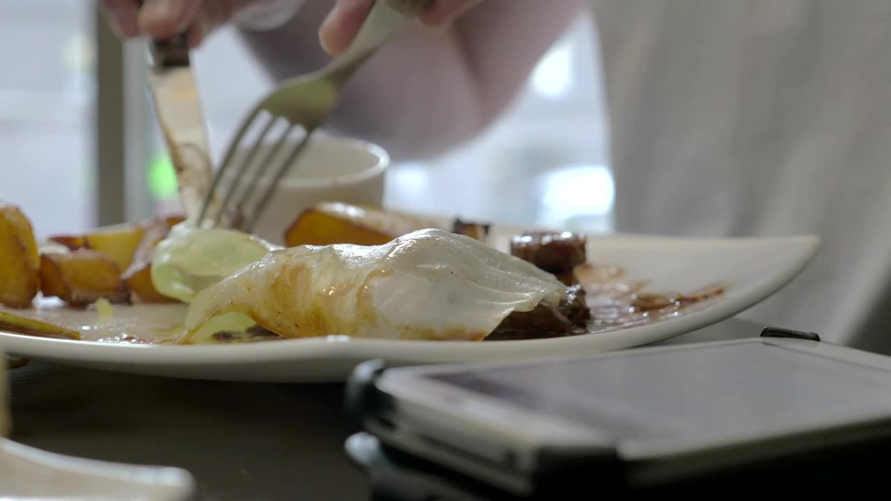   Stock Footage Woman Checking Her Phone During A Meal Live Wallpaper
