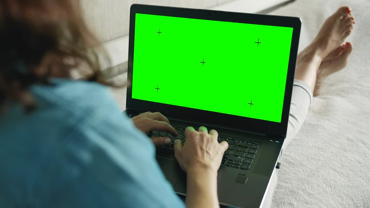   Stock Footage Woman Browsing Website On Laptop Greenscreen In Bed Live Wallpaper