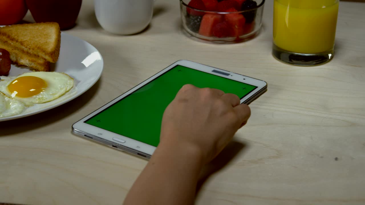   Stock Footage Woman Browsing On A Tablet Live Wallpaper