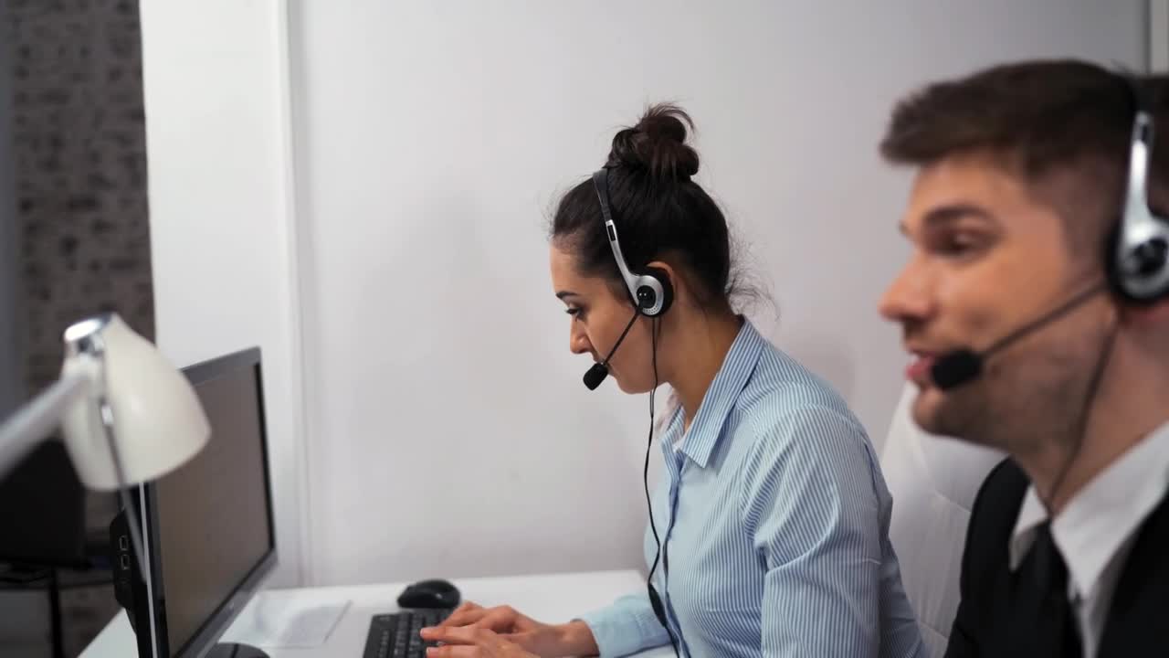   Stock Footage Woman And Man Working At A Call Center Live Wallpaper