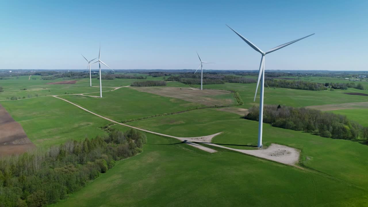   Stock Footage Wind Turbines On A Green Field Live Wallpaper