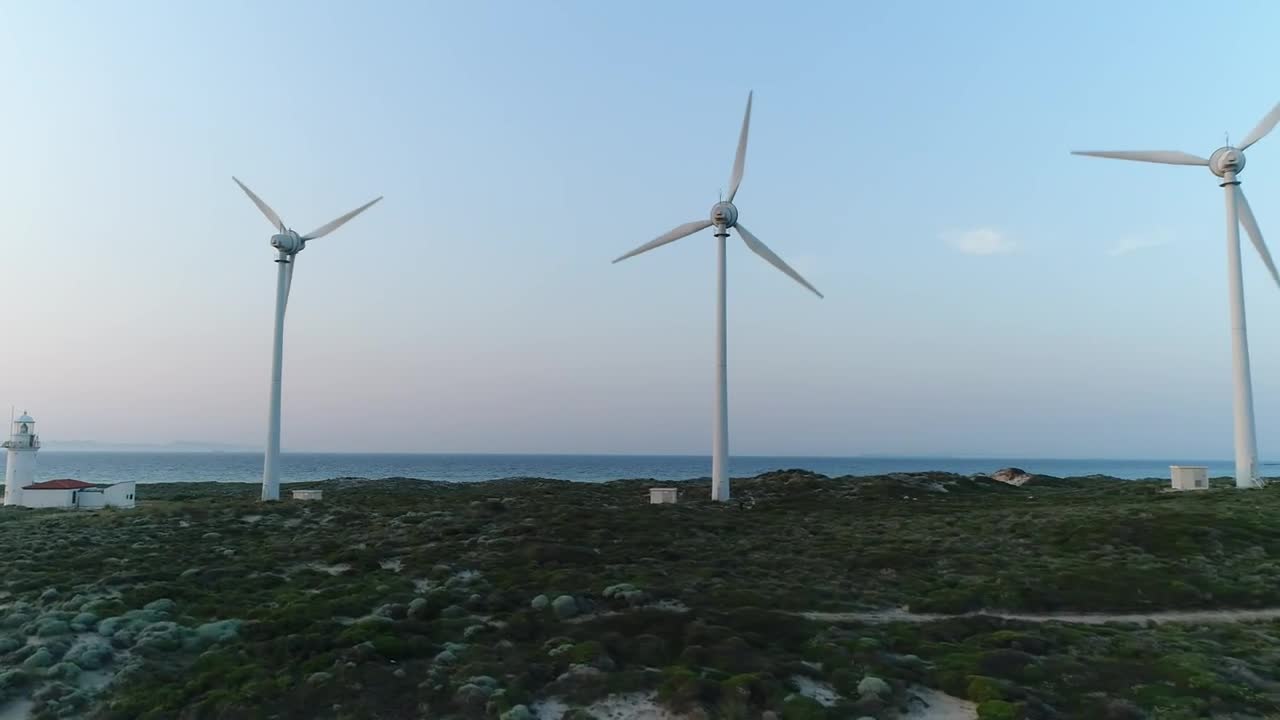  Stock Footage Wind Turbines Next To A Lighthouse Live Wallpaper