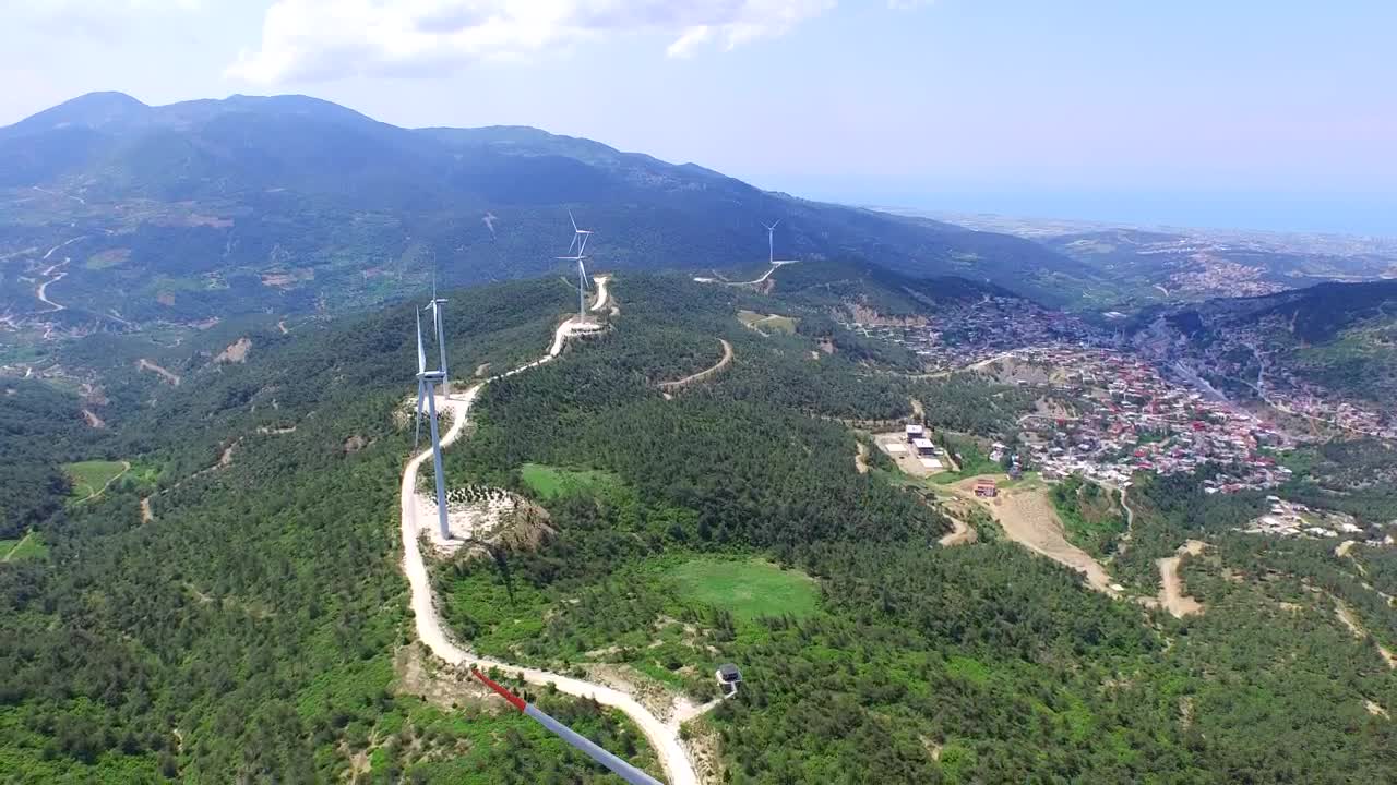   Stock Footage Wind Turbines In The Edge Of A City Live Wallpaper