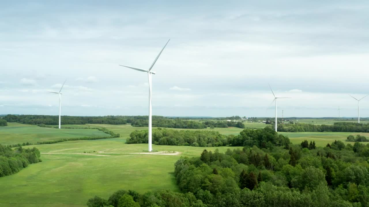   Stock Footage Wind Turbine Installations Across A Field Live Wallpaper