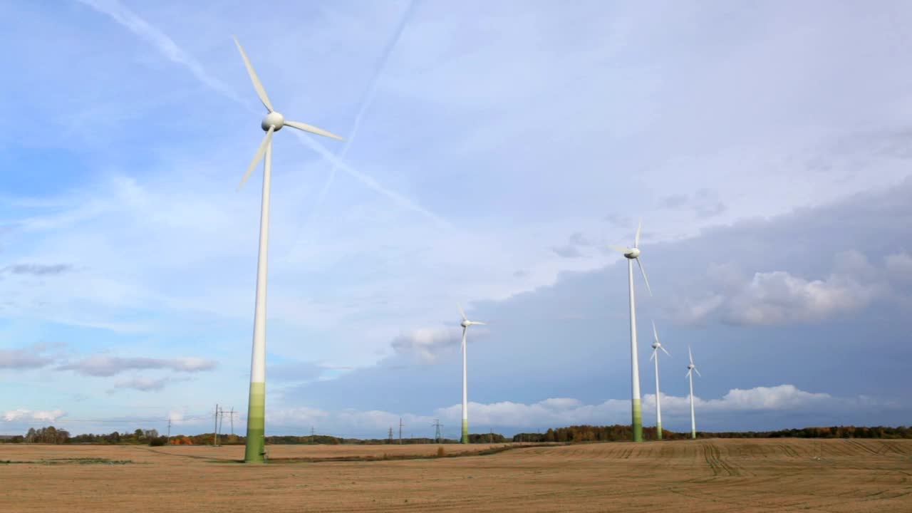   Stock Footage Wind Farm In A Ploughed Field Live Wallpaper
