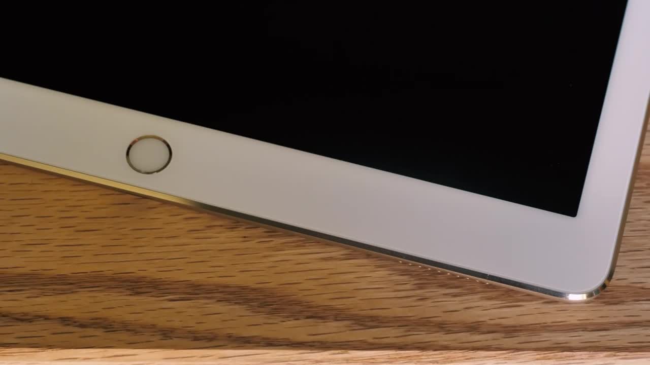   Stock Footage White Tablet On A Table Close Up Live Wallpaper