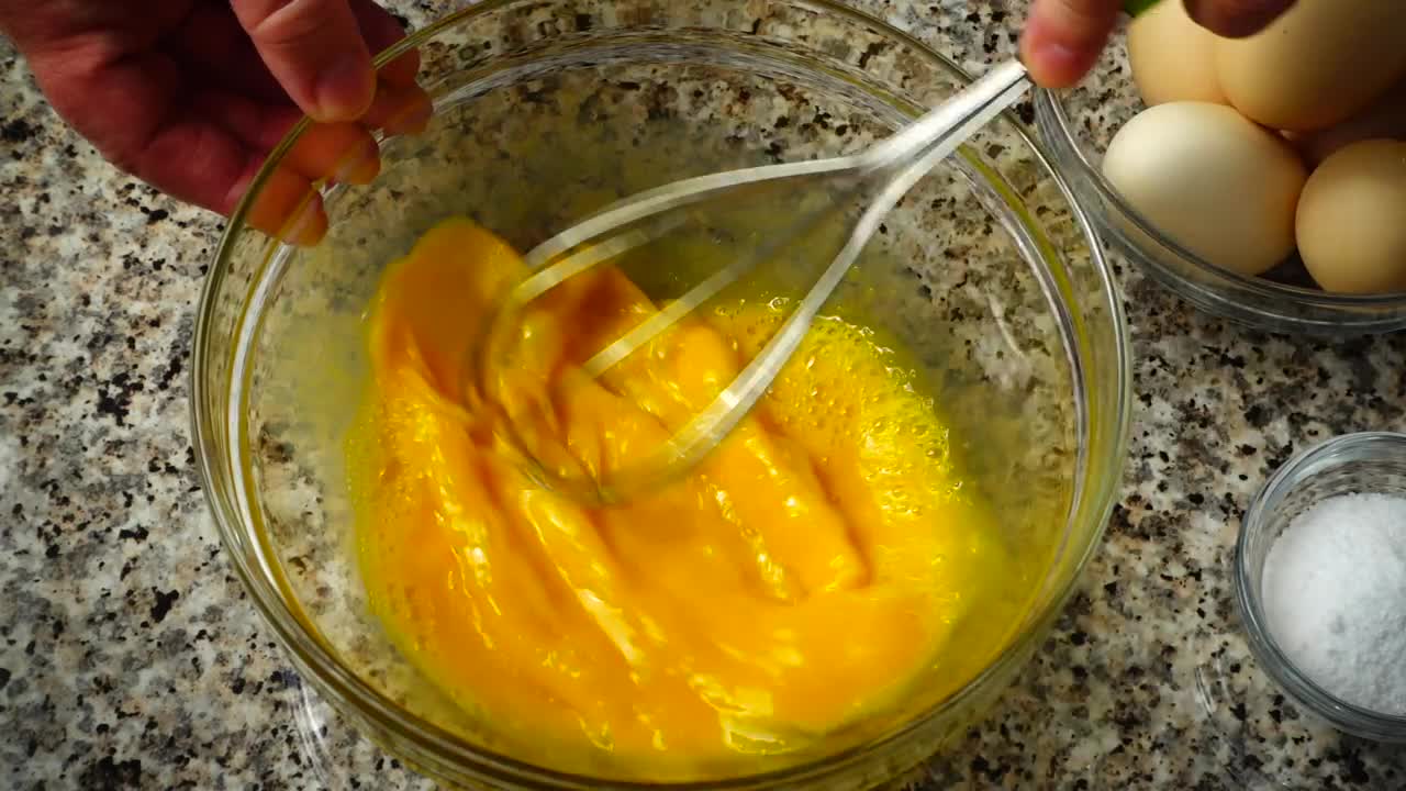  Stock Footage Whisking Eggs For An Omelette Live Wallpaper