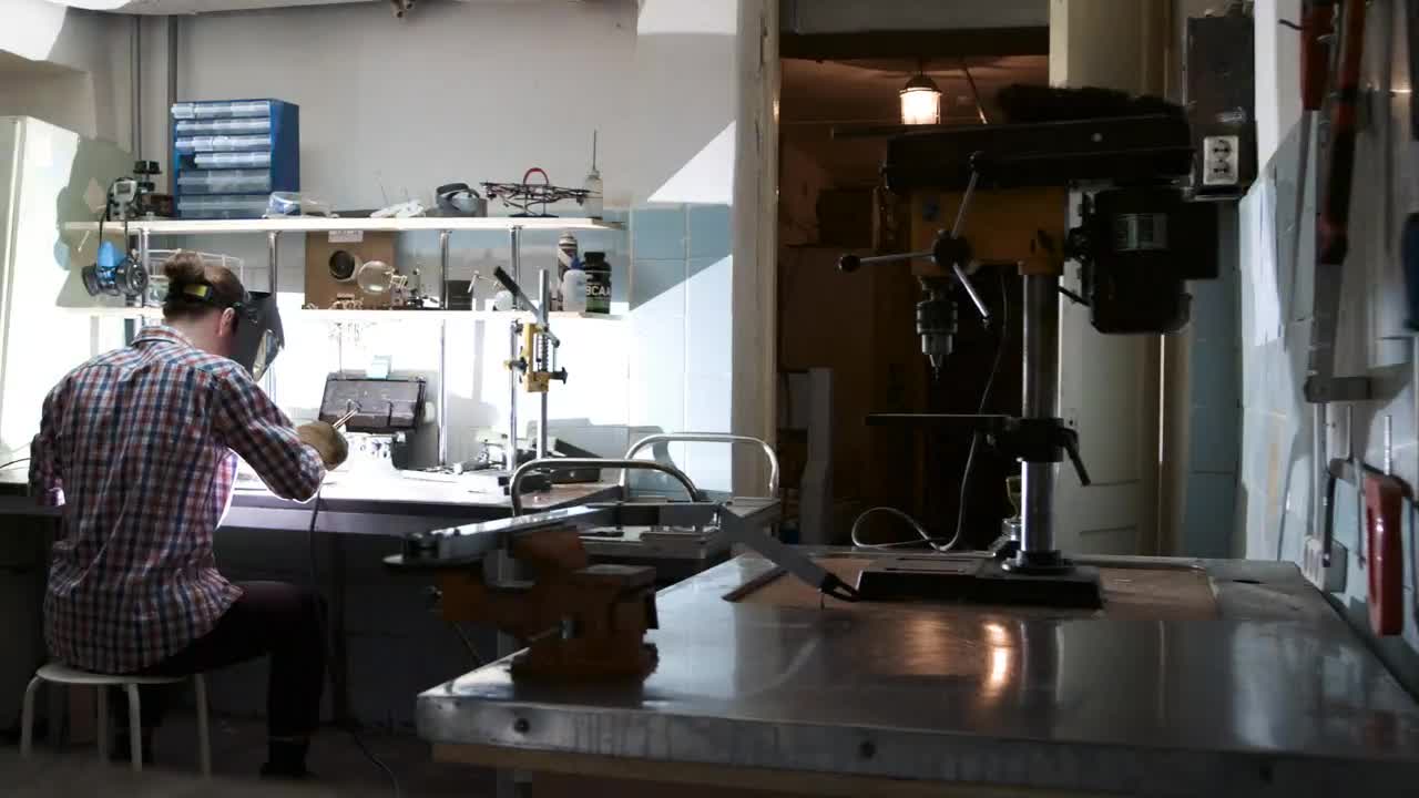   Stock Footage Welder Working At A Bench Live Wallpaper
