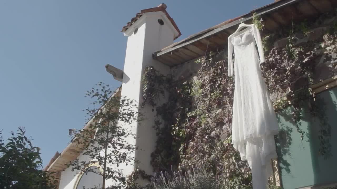   Stock Footage Wedding Dress Hanging Outside A House Live Wallpaper