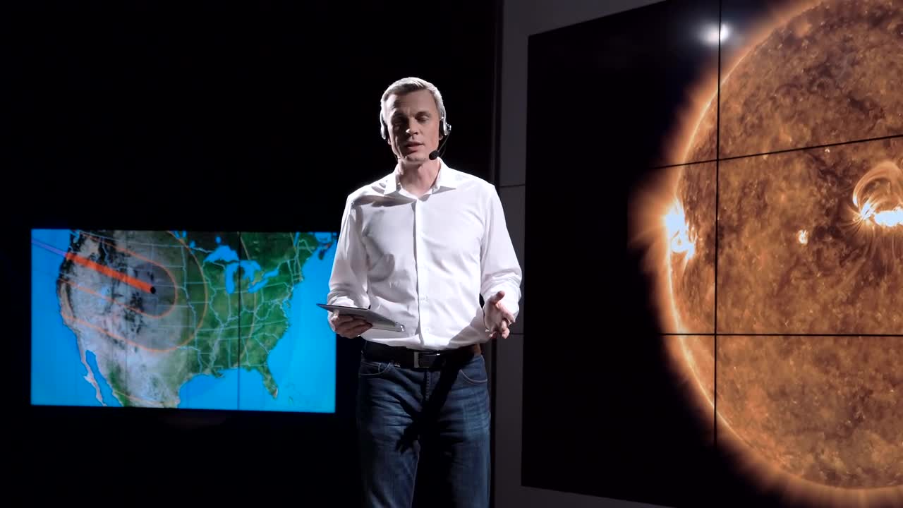   Stock Footage Weather Newscaster Presenting An Eclipse Live Wallpaper