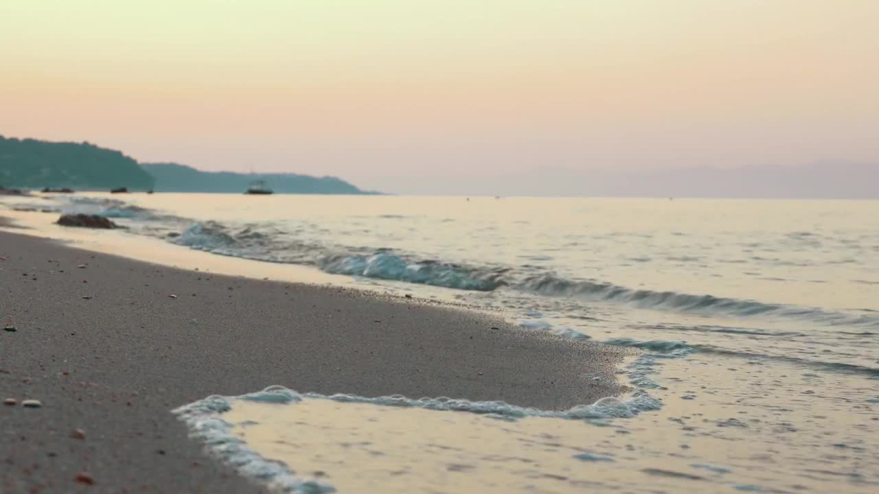   Stock Footage Waves Washing Up Against A Clean Beach Live Wallpaper
