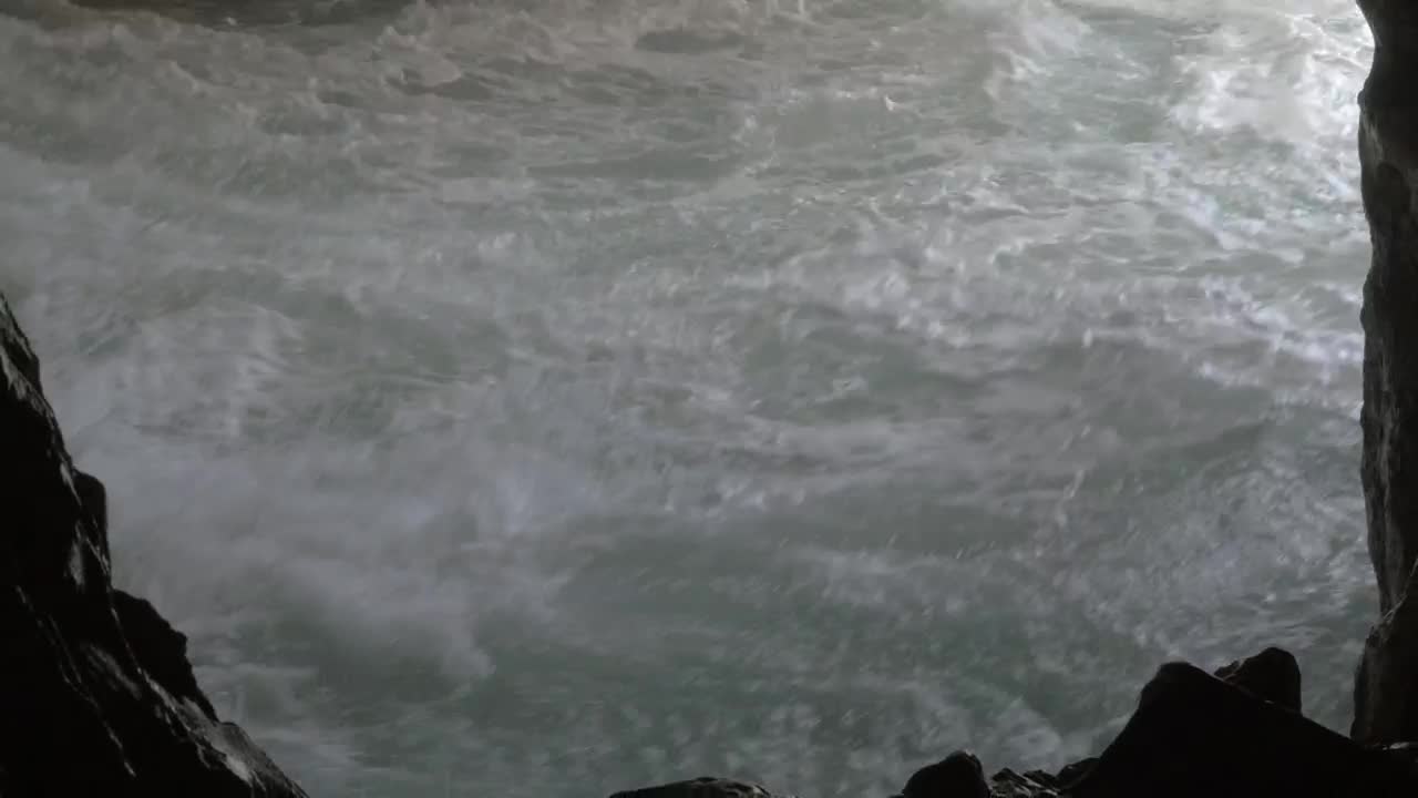   Stock Footage Waves Breaking Inside A Cave Live Wallpaper