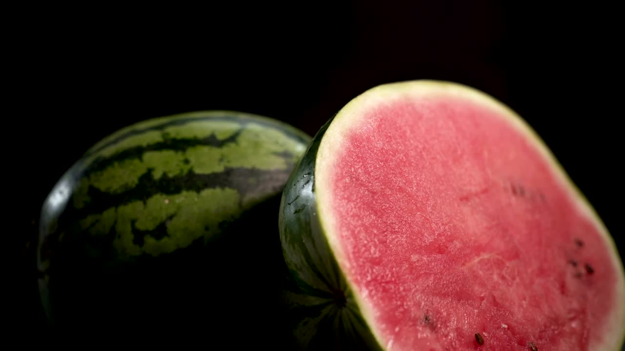   Stock Footage Watermelons On A Black Background Live Wallpaper