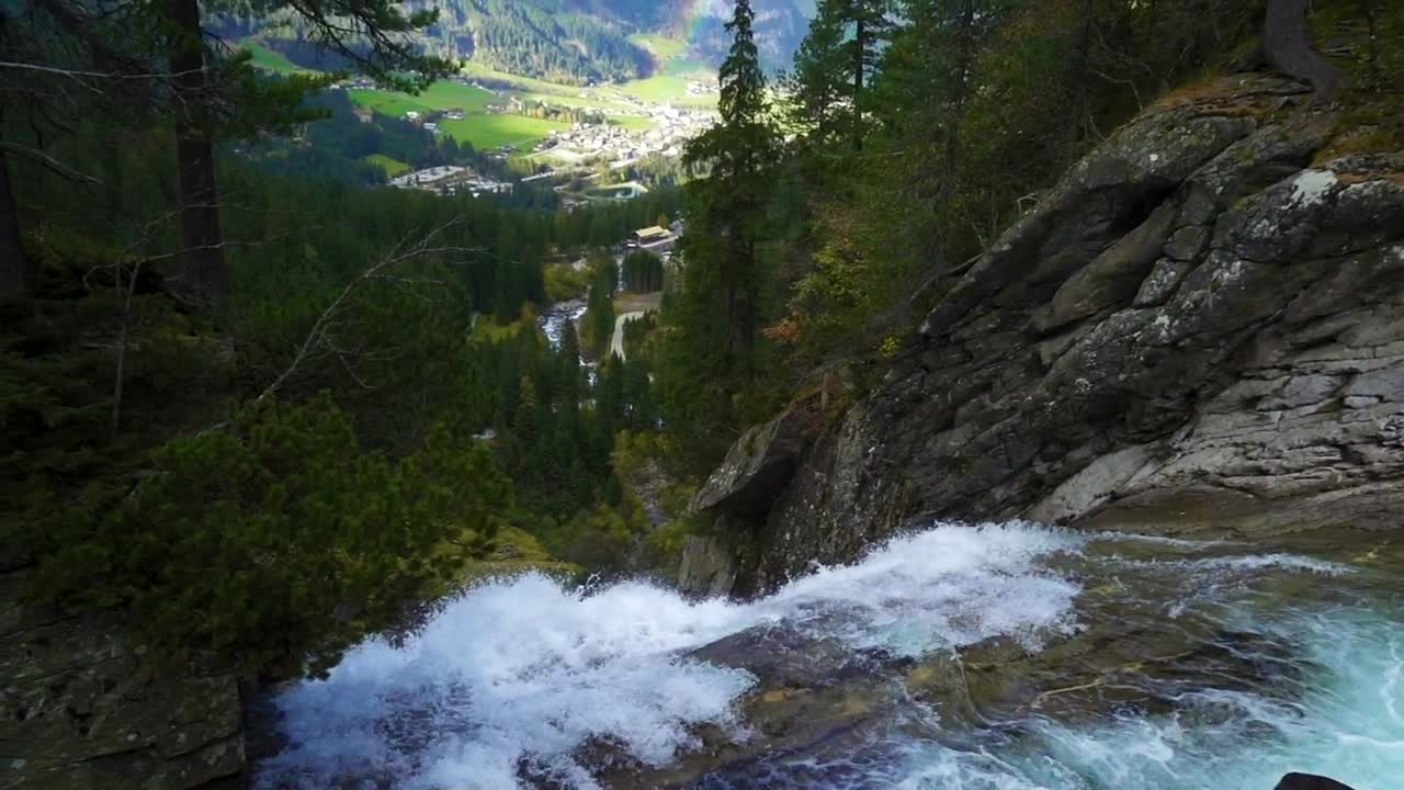   Stock Footage Waterfall In The Forest With A Town And A Rainbow Live Wallpaper