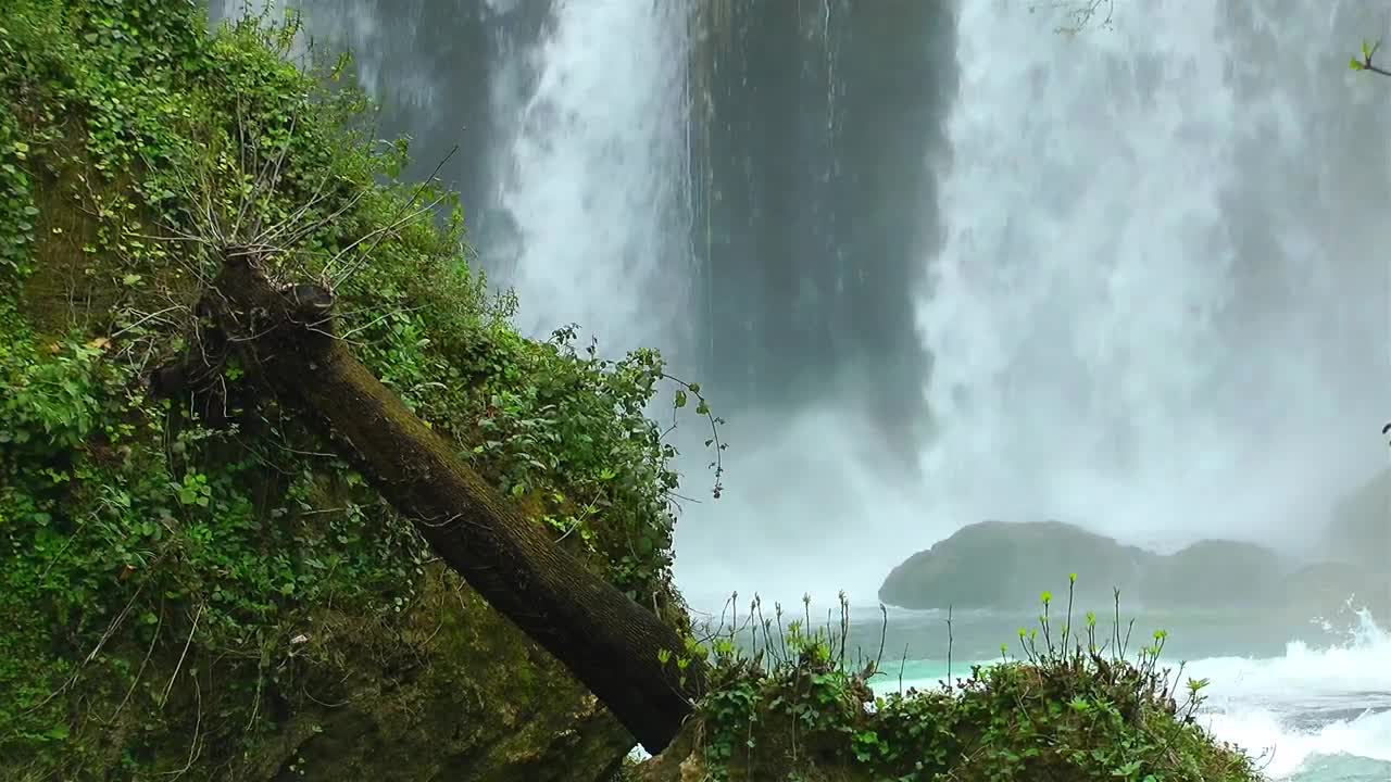   Stock Footage Waterfall Behind The Rocks Live Wallpaper