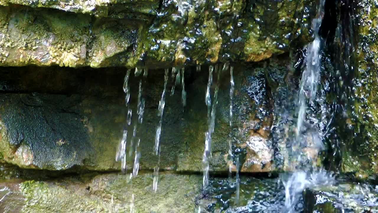   Stock Footage Water Running Off Rocks Live Wallpaper