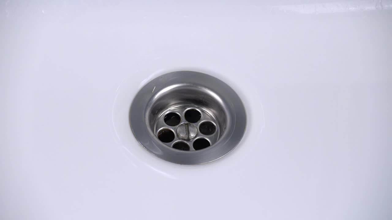   Stock Footage Water Goes Down The Drain In The Bathroom Live Wallpaper