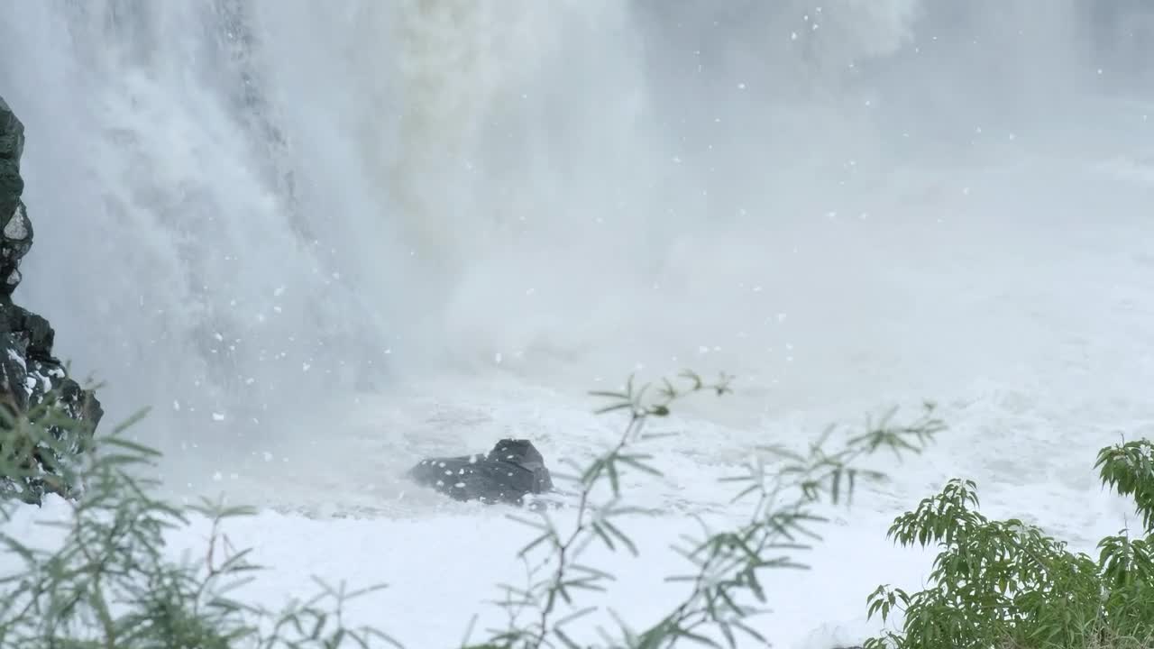   Stock Footage Water From A Rocky Waterfall Falling To The Bottom Of Live Wallpaper