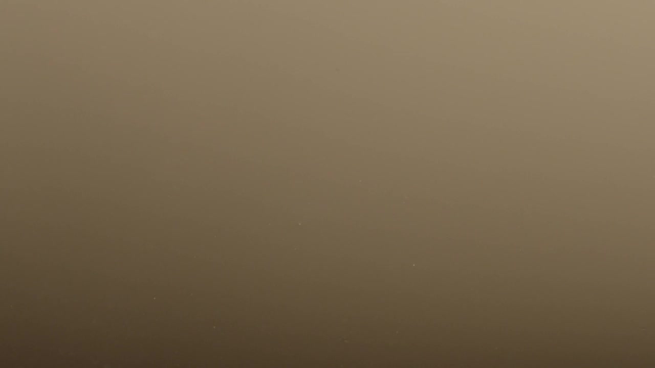   Stock Footage Water Dropping Into Brown Liquid Live Wallpaper