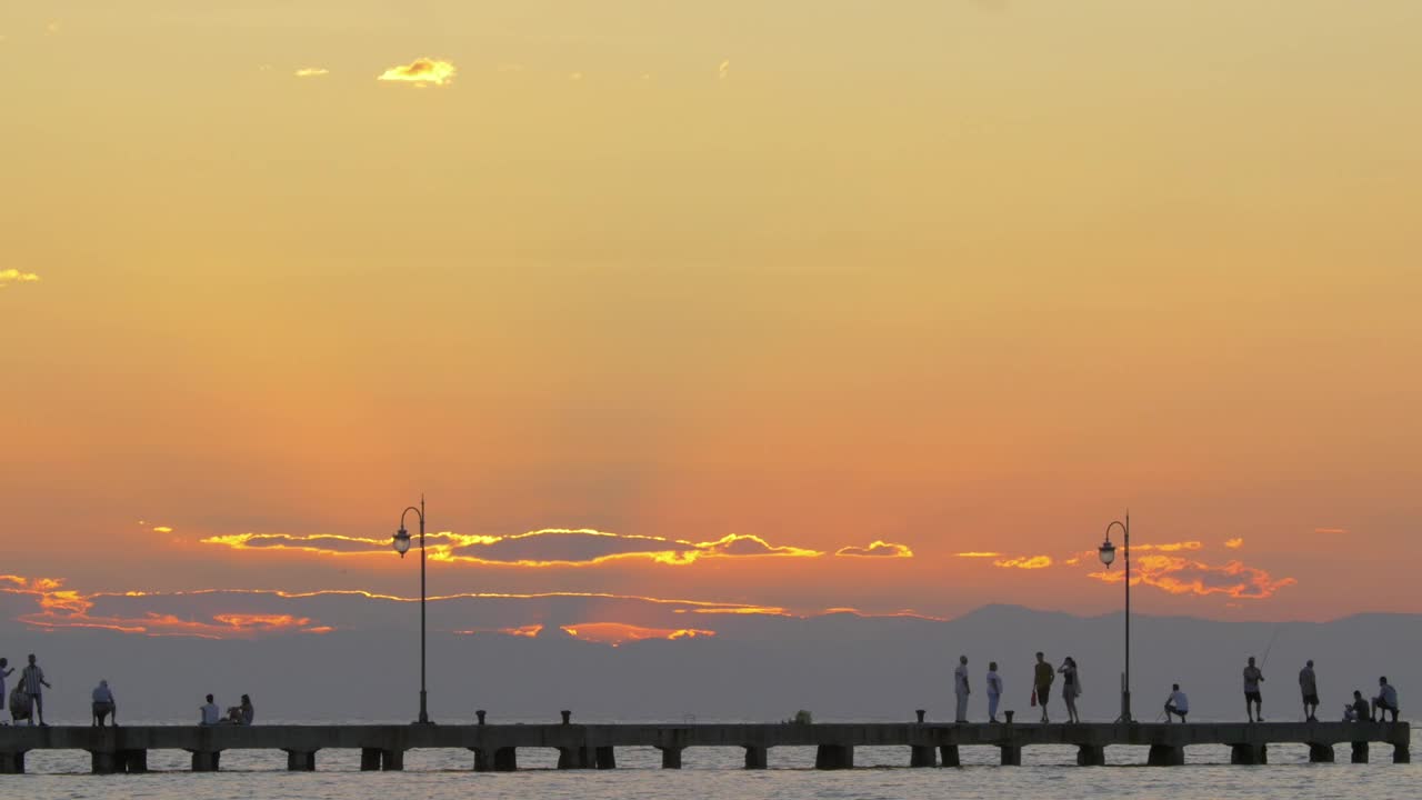   Stock Footage Watching The Sun Go Down From A Pier Live Wallpaper