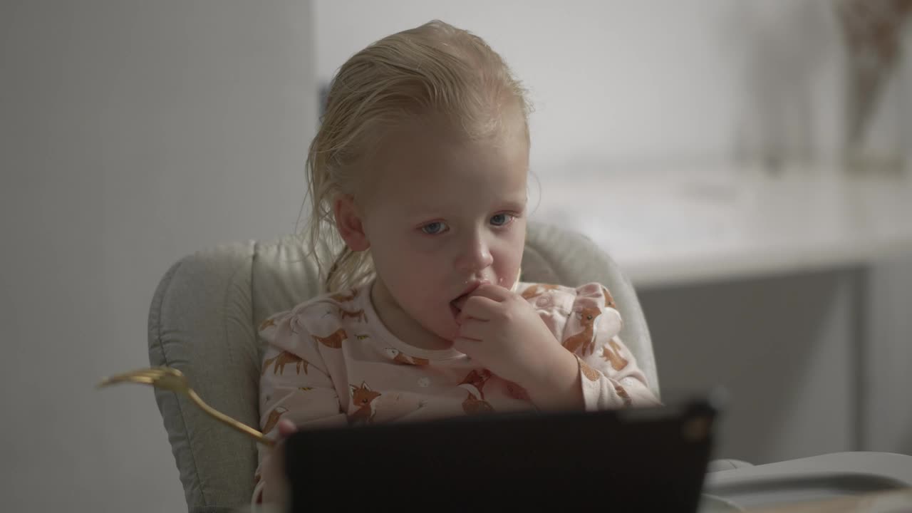   Stock Footage Watching A Cartoon While Having A Snack Live Wallpaper