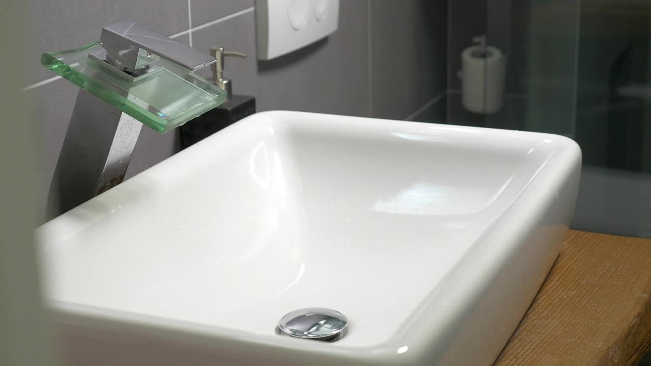   Stock Footage Washing In A Modern Sink Live Wallpaper