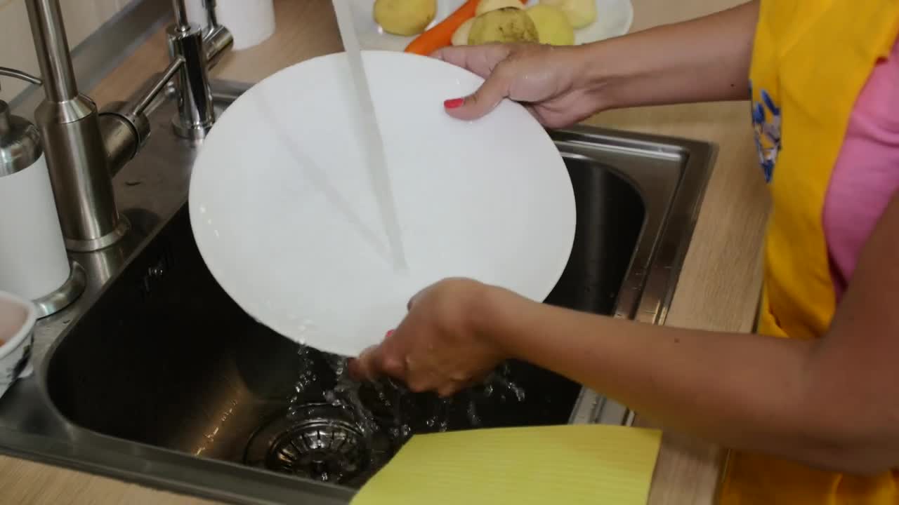  Stock Footage Washing Dishes In The Kitchen Live Wallpaper