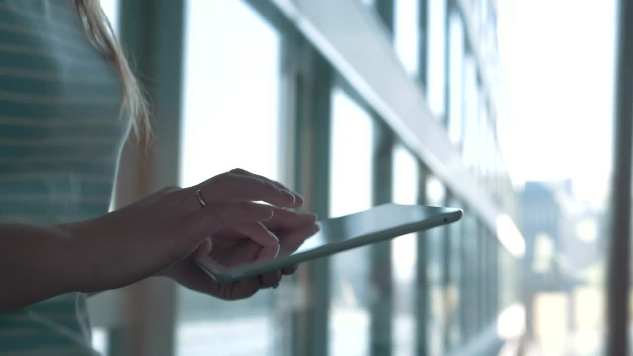   Stock Footage Walking Quickly With A Tablet Live Wallpaper