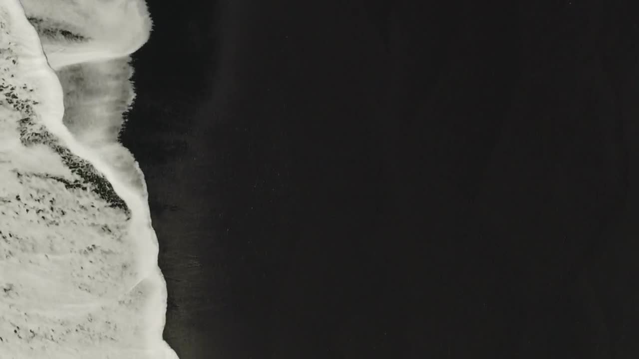   Stock Footage Walking Along A Dark Sand Beach Live Wallpaper