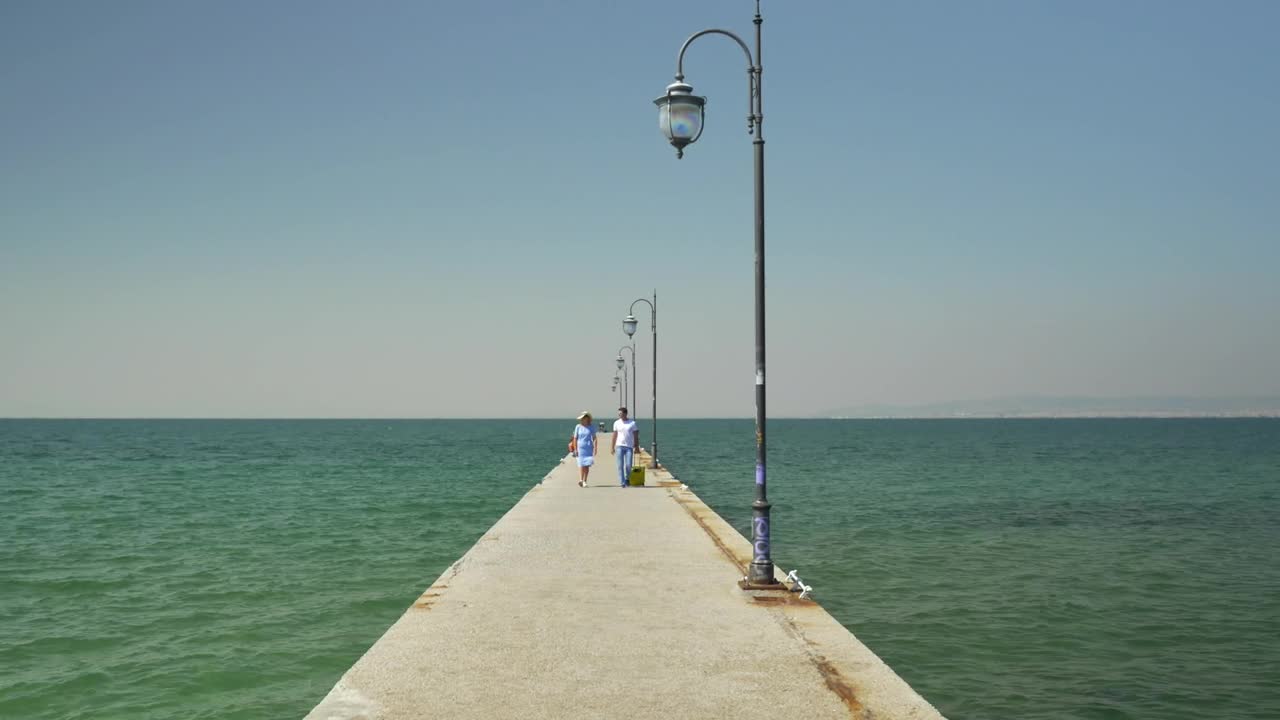   Stock Footage Walking Along A Concrete Pier Live Wallpaper