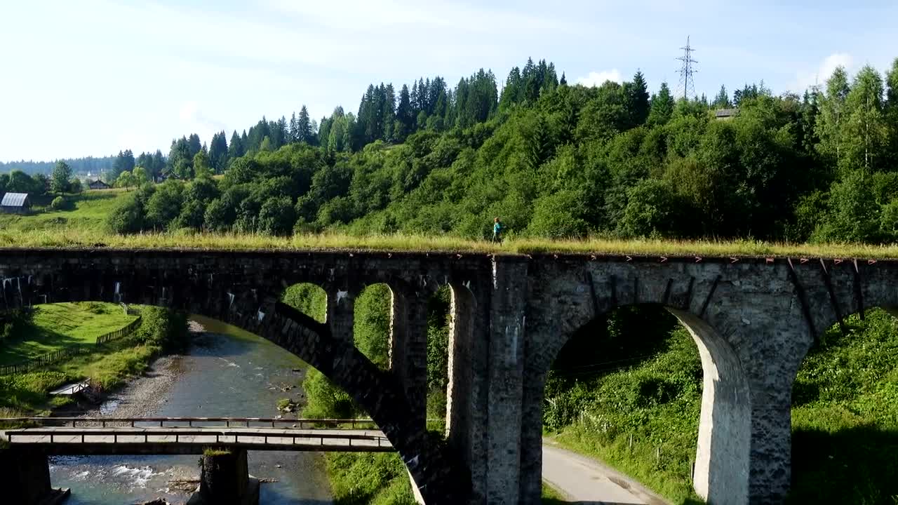   Stock Footage Walking Above An Ancient Stone Bridge Live Wallpaper