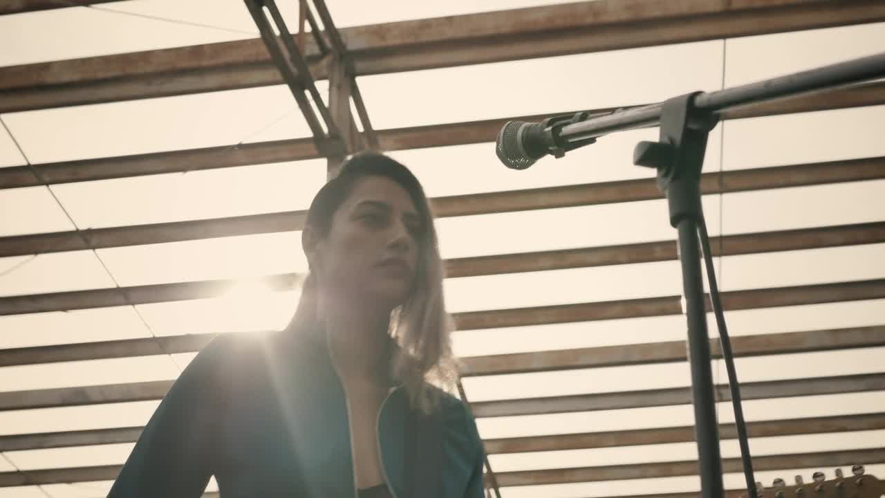   Stock Footage Vocalist And Guitarist Of A Rock Band Singing Live Wallpaper