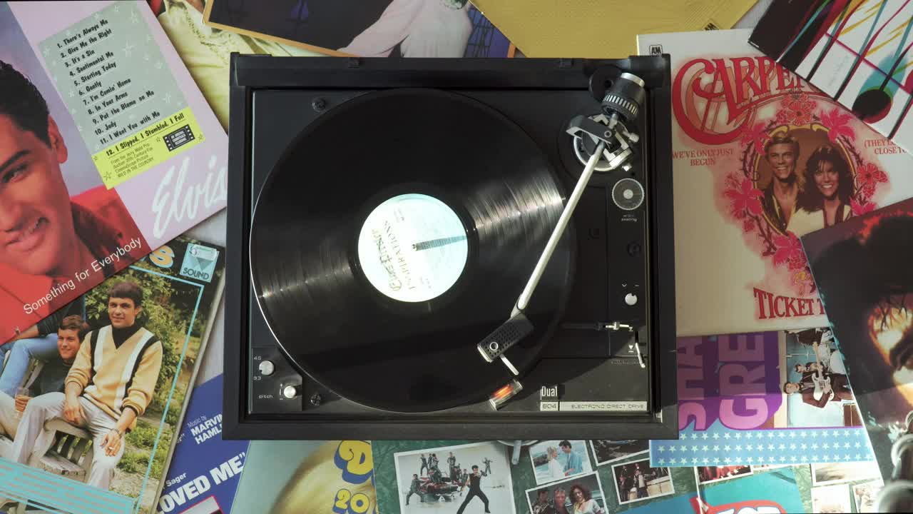   Stock Footage Vintage Turntable Surrounded By Many Albums Live Wallpaper