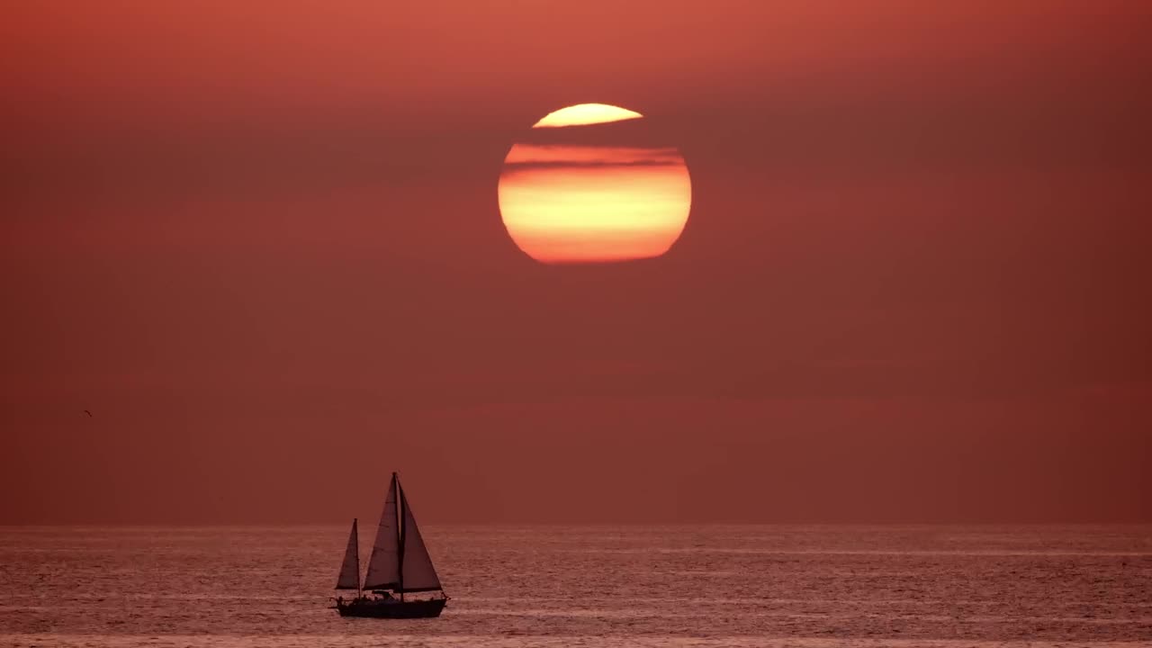   Stock Footage View Of The Horizon In The Sea While A Sailboat Live Wallpaper