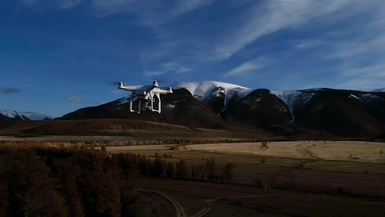   Stock Footage View Of Drone Flying Over Trees Towards Mountain Live Wallpaper