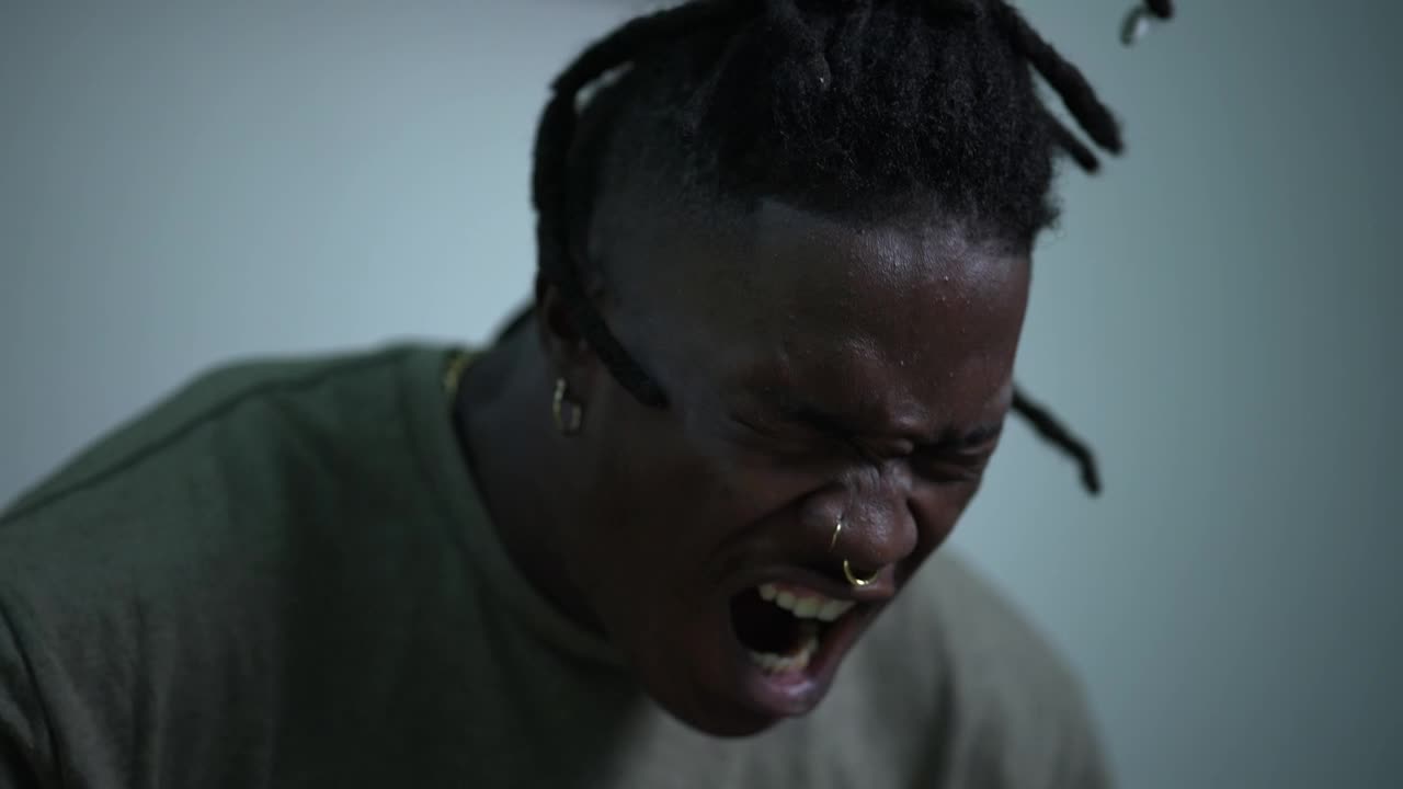   Stock Footage Very Desperate Boy Screaming Loud Expressing His Pain Live Wallpaper