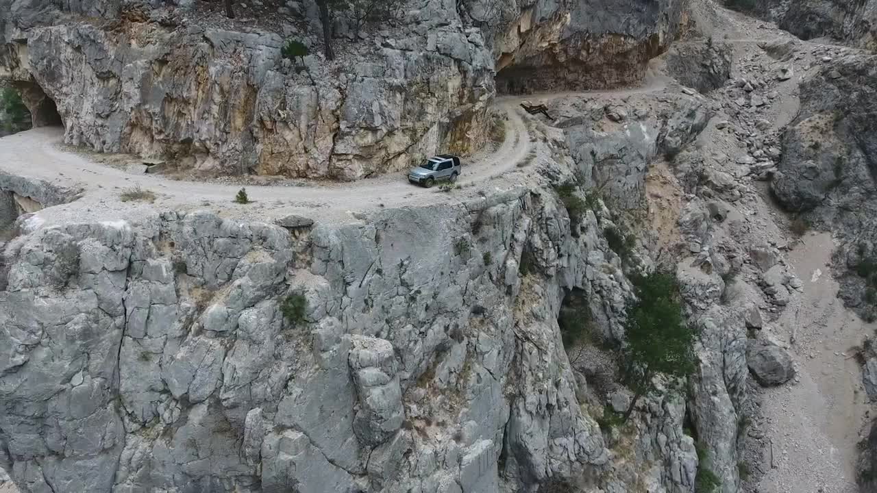   Stock Footage Vehicle Driving Through The Rocky Mountain Road Live Wallpaper