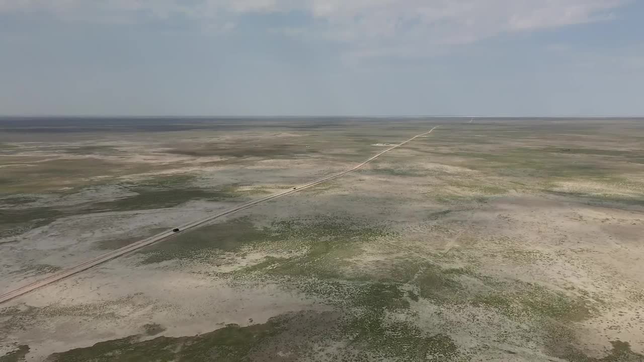   Stock Footage Van Driving Down A Long Dusty Road Live Wallpaper
