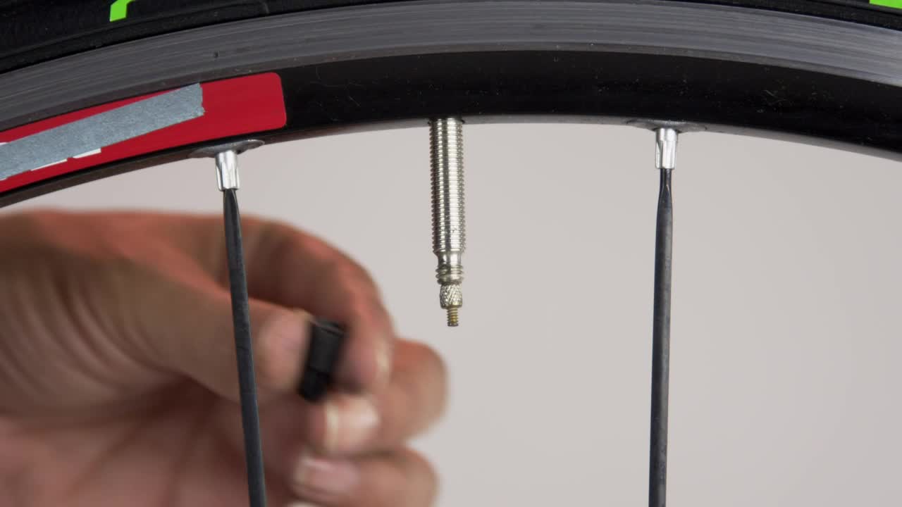   Stock Footage Valve Cap On A Bicycle Wheel Live Wallpaper