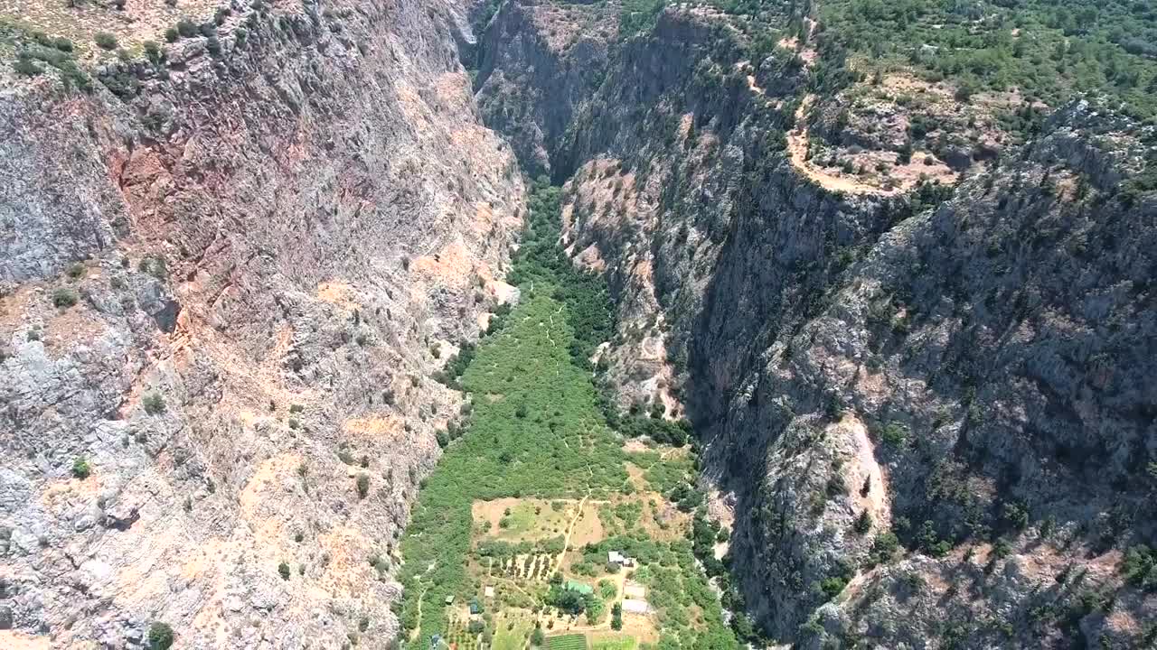   Stock Footage Valley Between Rocky Mountains And A Paradisiac Beach Live Wallpaper