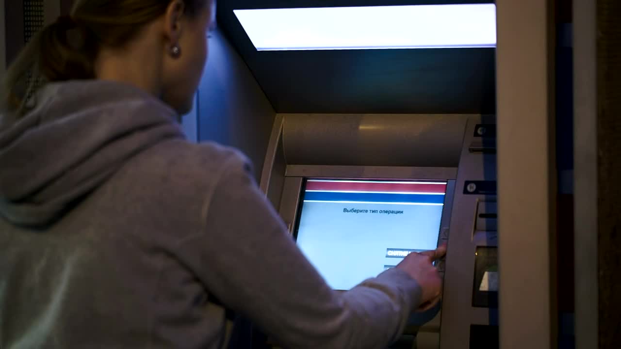   Stock Footage Using An Atm Machine Live Wallpaper