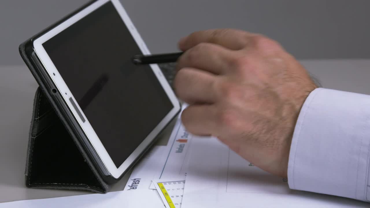   Stock Footage Using A Tablet Calculator Live Wallpaper
