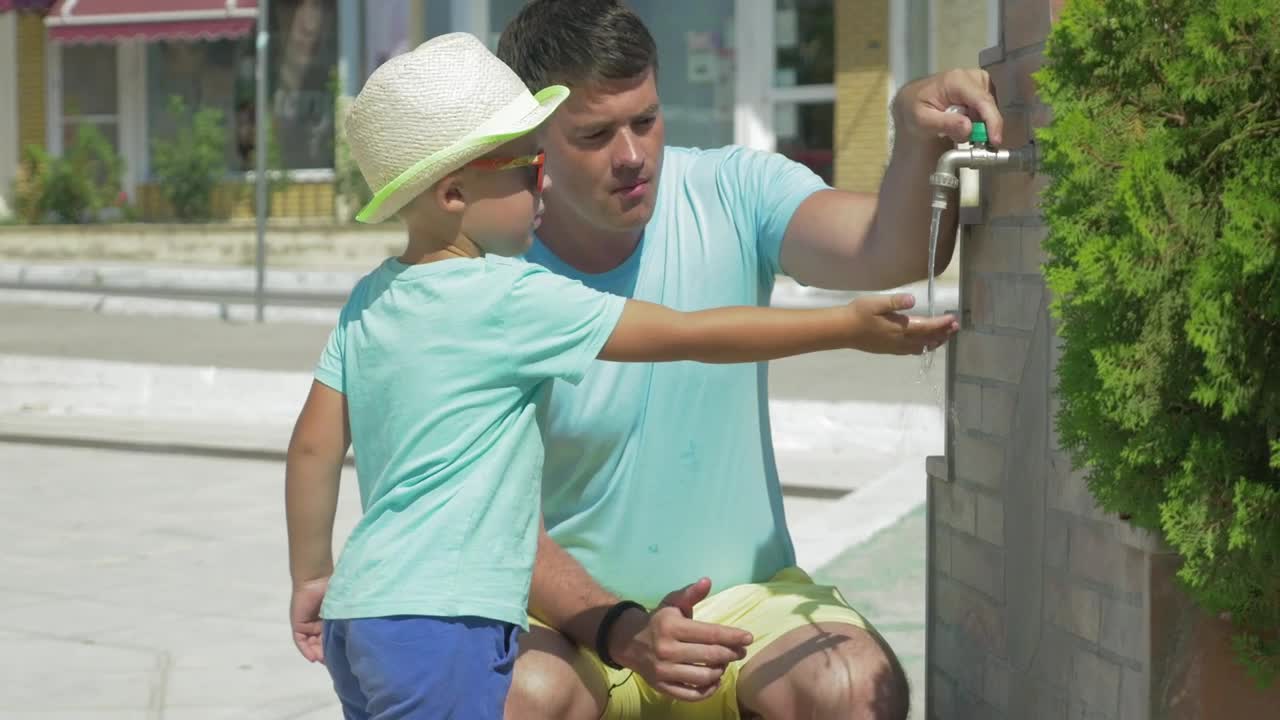   Stock Footage Using A Public Fountain To Wash Live Wallpaper