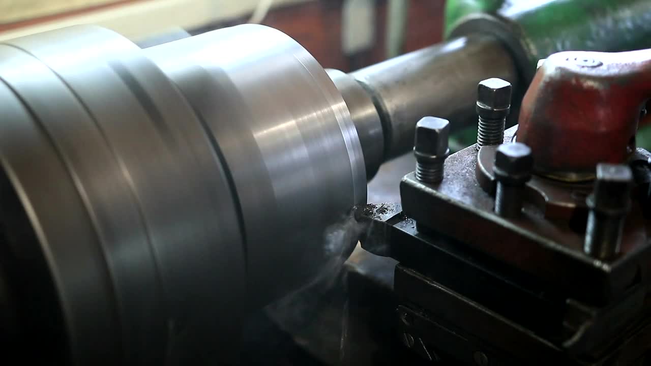   Stock Footage Using A Lathe To Cut Metal Live Wallpaper