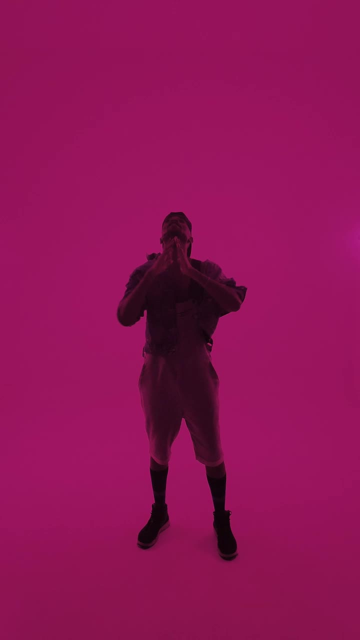   Stock Footage Urban Trendy Man Posing With Pink Filter Live Wallpaper