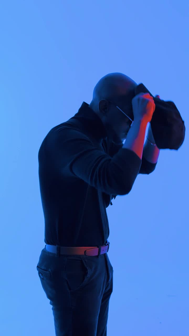   Stock Footage Urban Trendy Mans Portrait With Blue Background Live Wallpaper