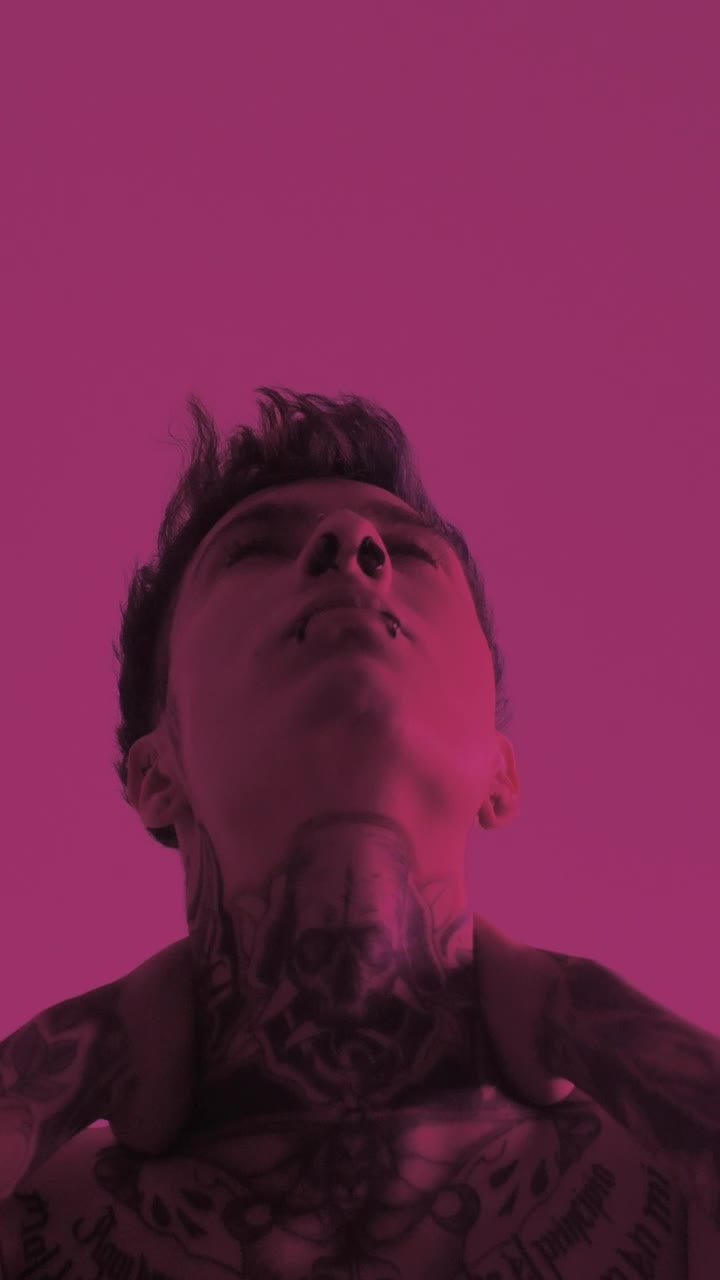   Stock Footage Urban Mans Portrait In A Pink Light Room Live Wallpaper